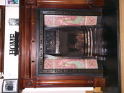 Cast iron fire place with surround and grate